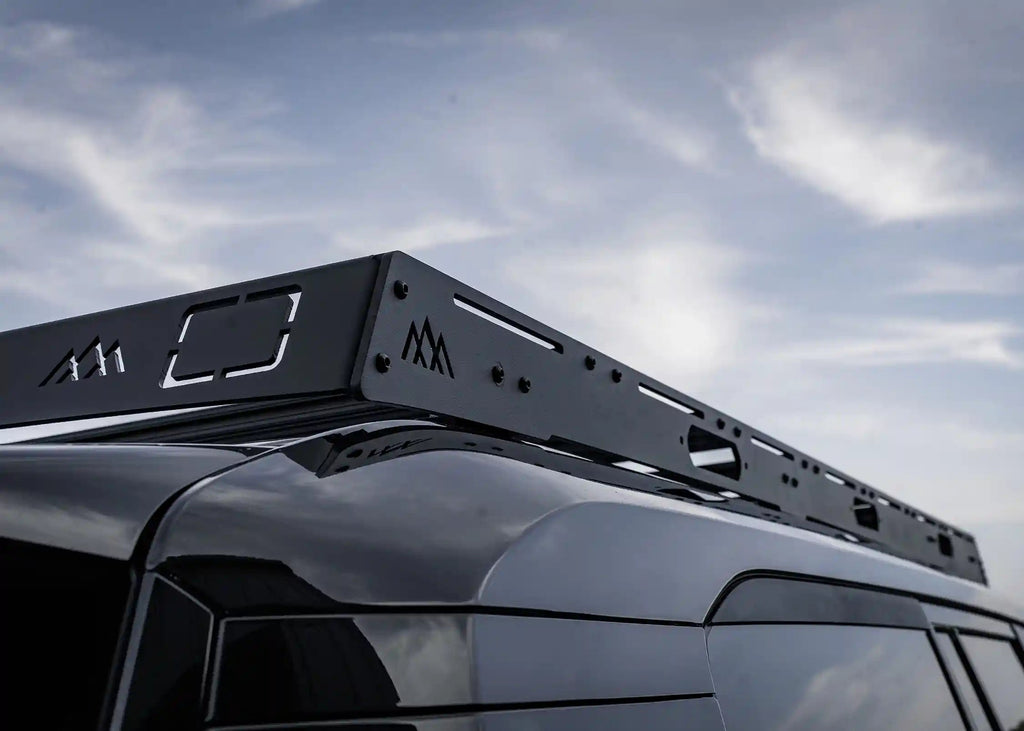 Backwoods DRIFTR LC250 roof rack installed on black Toyota Land Cruiser 250