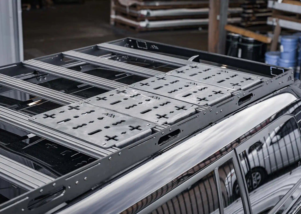 Backwoods DRIFTR LC250 roof rack with modular deck panel accessories installed