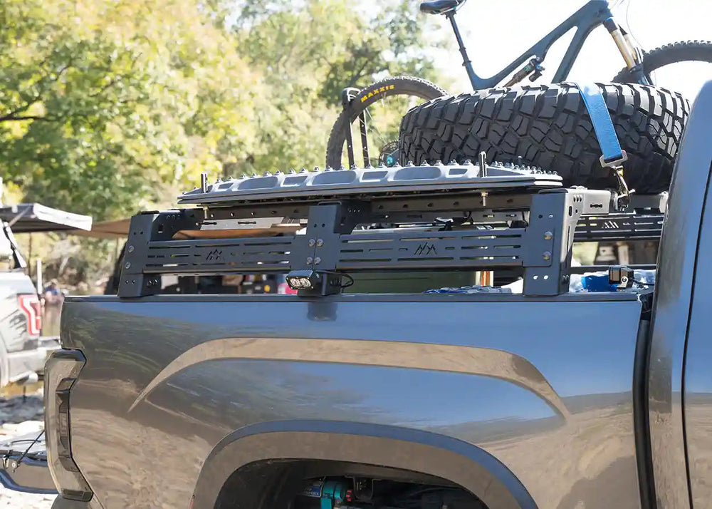 Toyota Tundra Mid-Height Bed Rack in use hauling gear