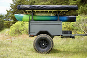 Side View Of The Trail Trailer MOD With A Mounted Roof Top Tent