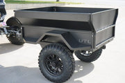 Side View Of The Attached Trail Trailer UTL