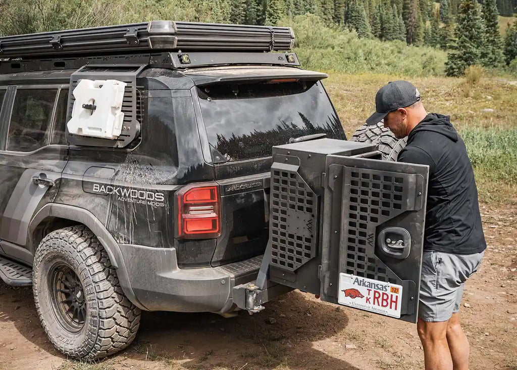 Toyota Land Cruiser with Backwoods Overland Storage Box open while camping