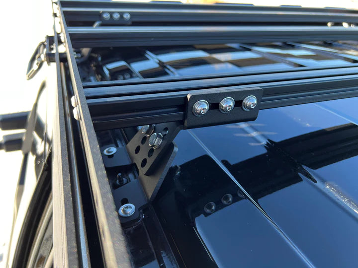 Close up view of the bolts and screws of the alpha platform roof rack mounted on a ford truck