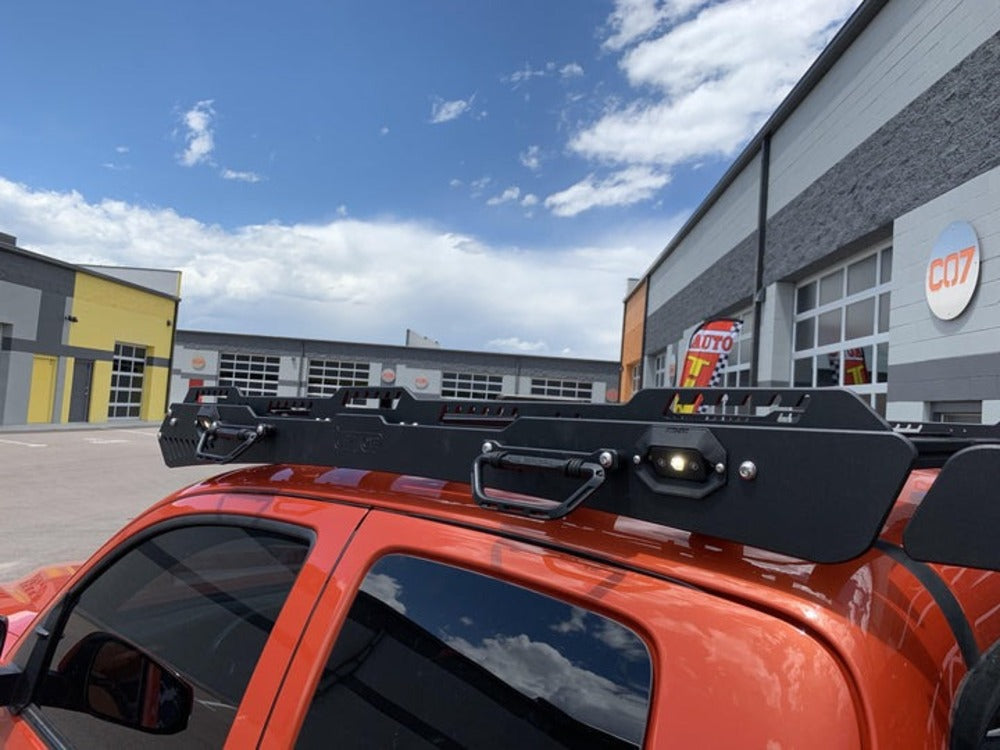 Side View Of The upTOP Overland Alpha Tacoma Roof Rack With Integrated Grab Handles