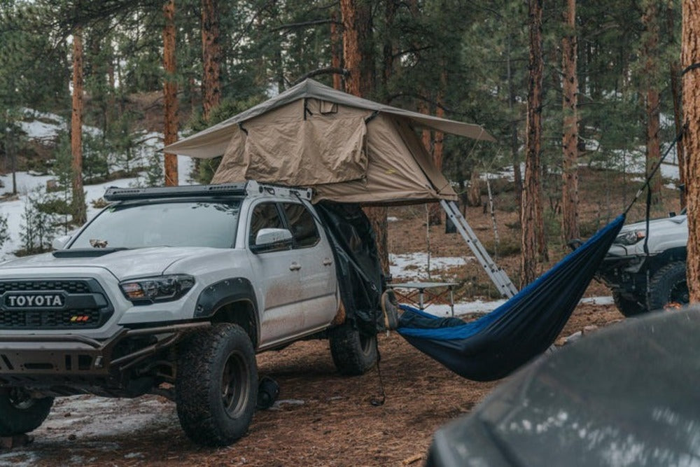 Toyota Tacoma With A upTOP Overland Alpha Tacoma Roof Rack Carrying A Roof Top Tent