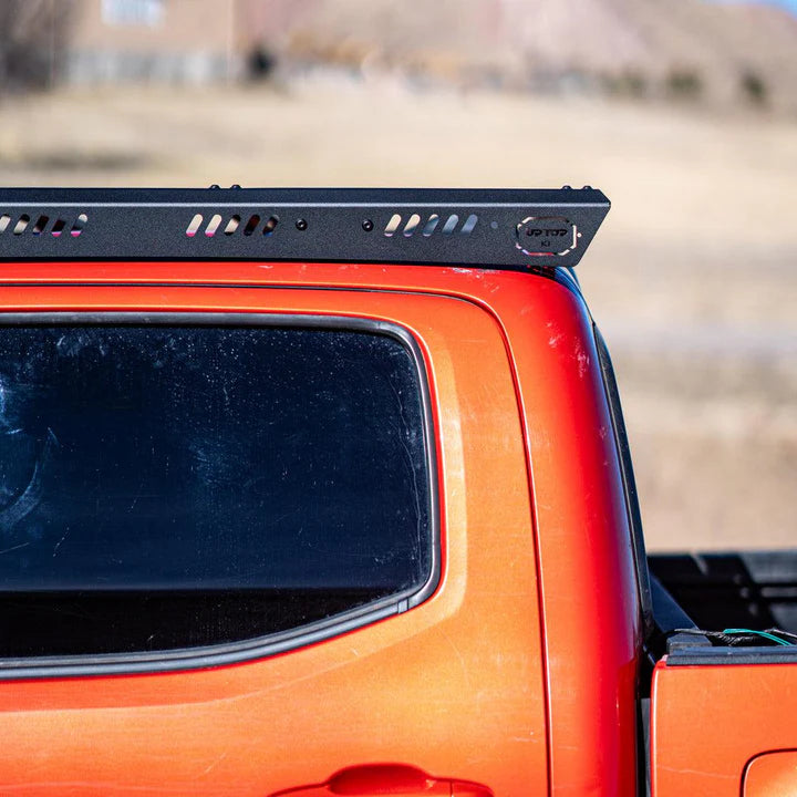 Close up side view of the Tacoma with the uptop overland kilo roof rack mounted