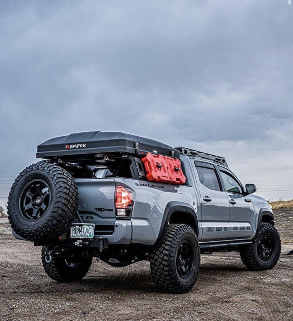 upTOP Overland Tacoma TRUSS Bed Rack With A Roof Top Tent Mounted