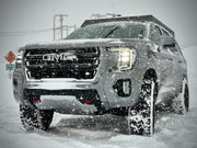 Westcott Designs Yukon & Tahoe Roof Rack Mounted On A GMC In The Snow