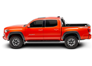 Left View Of BAKFlip MX4 Truck Bed Cover With Deck Rail System For Toyota Tacoma 2005-2015