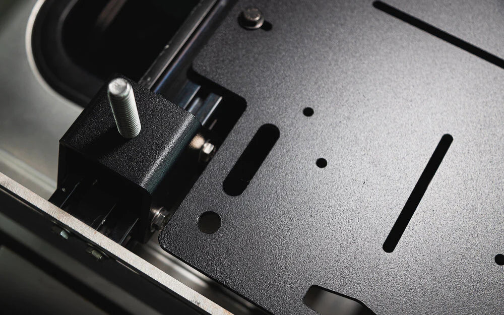 This plate features mounting locations for RotoPax, NMO antennas, various tie-downs, in addition to multiple sliding tracks positioned throughout.