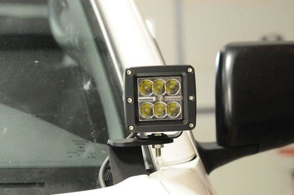 CBI Offroad Fab Toyota Tundra 2000-2006 Ditch Light Brackets Mounted On A Hood Of A Car