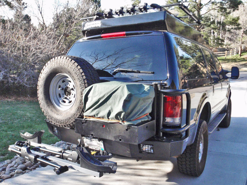Ford Excursion installed with Aluminess Rear Bumper with Brush Guard and Swing Arms