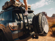 front runner 4runner hatch ladder with a person stepping on it