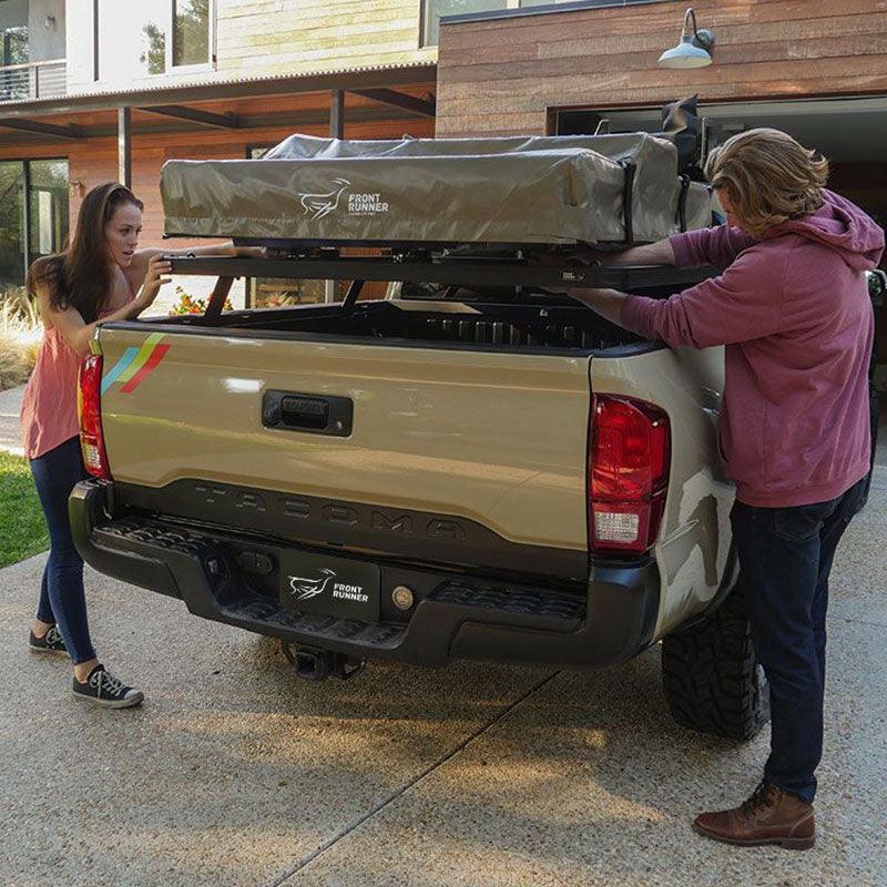 unclipping roof top tent quick release image