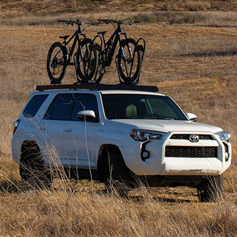 Slimsport platform roof rack by Front Runner mounted on Toyota with Bikes