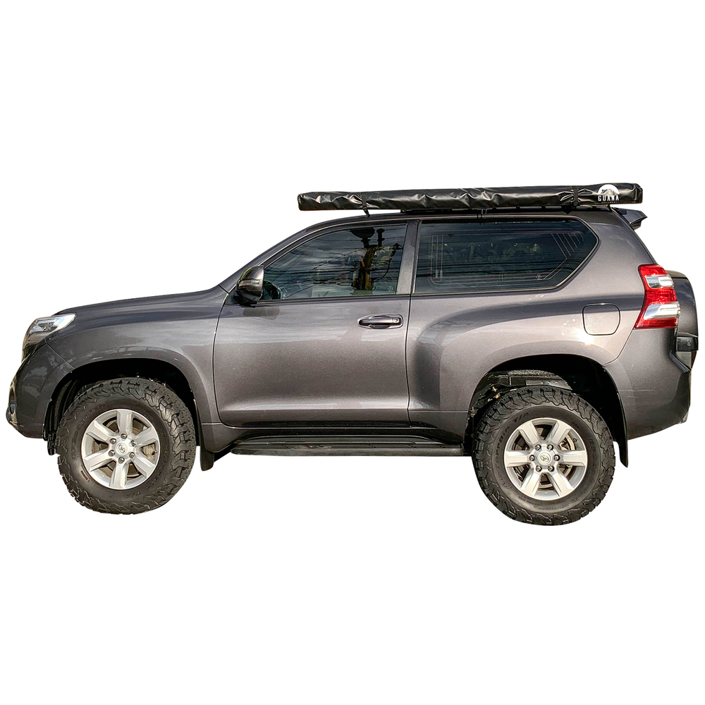 Guana Awning Closed On Top of Car Side View