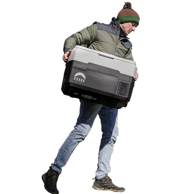 Guana Equipment Monteverde MV30 & MV50 Electric Portable Fridge/Freezer carried by person