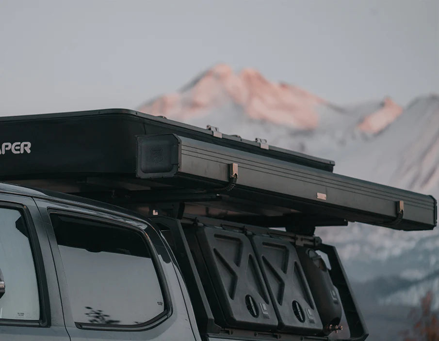 iKamper ExoShell Awning Hard Shell Attached To The Side Of The Vehicle