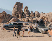 iKamper ExoShell Awning Deployed With Legs On A Sunny Day With Camper Outside