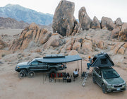 iKamper ExoShell Awning Deployed With Campers Next To It