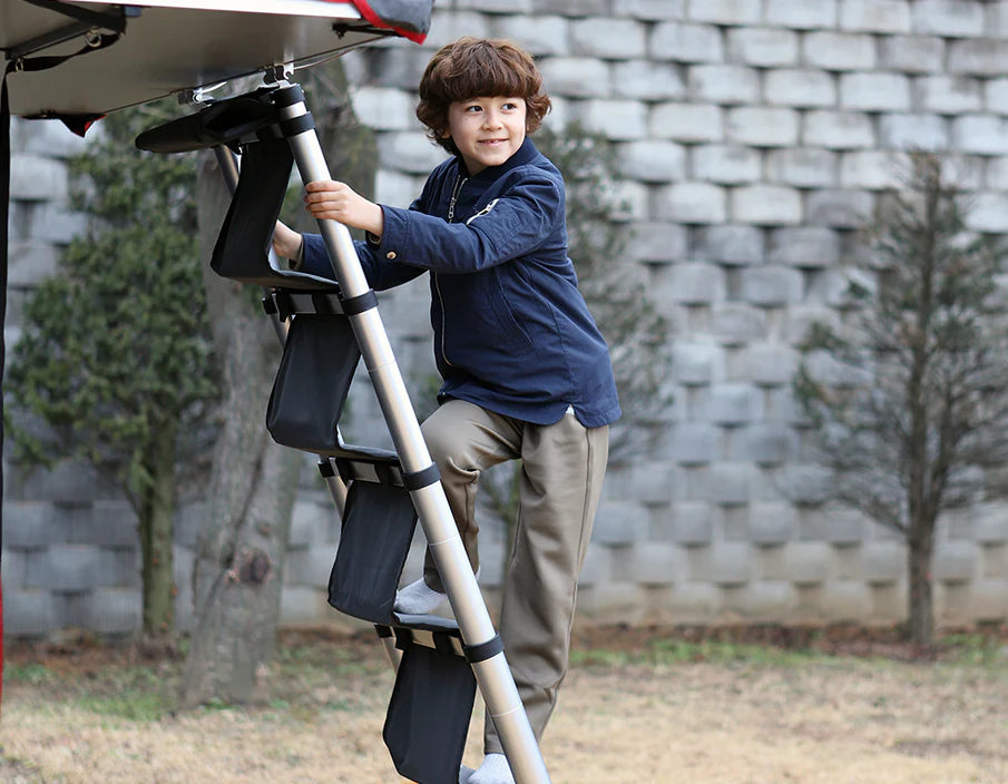 Kid Climbing Up The iKamper HC Steps