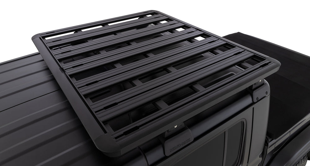 Channel on underside of front and rear extrusions