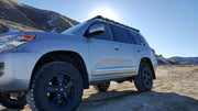 Prinsu Roof Rack on Land Cruiser Series 200 left side driving on sand