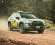 Prinsu Roof Rack on Rav4 color green driving in the forest