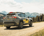 Prinsu Roof Rack on Rav4 parked on the road in front of mountains