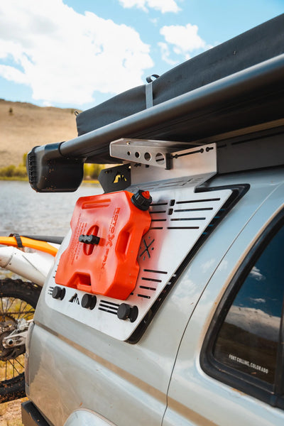 Sherpa Window Panel Carrying a Water Canister