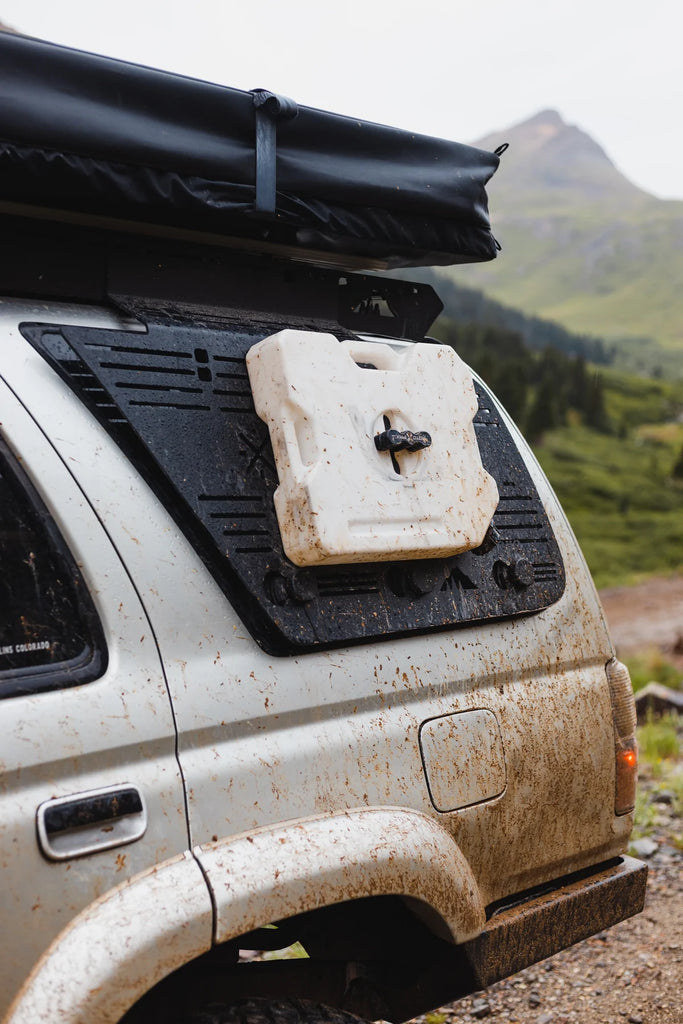 Sherpa Window Panel Carrying a Jerry Can 