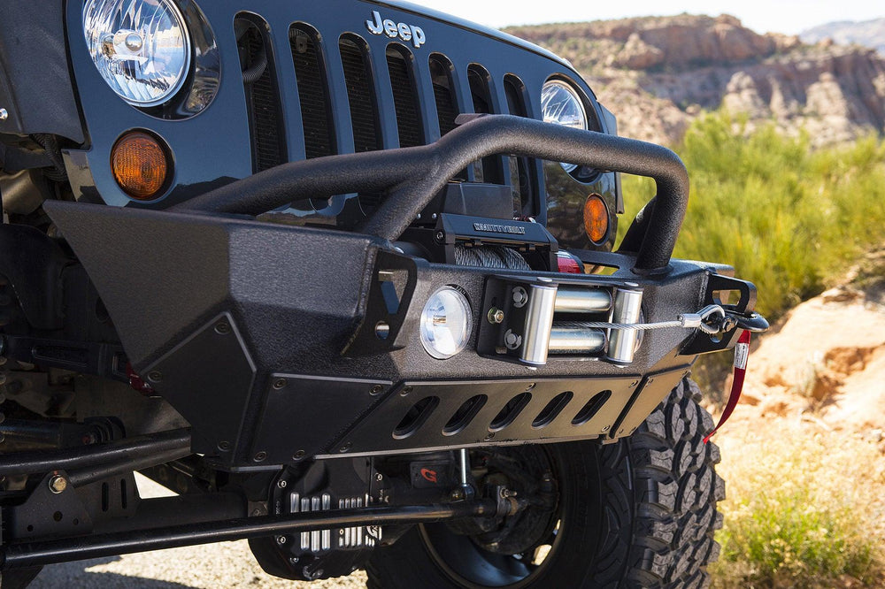 the Smittybilt 97495 XRC-9.5 Gen2 Waterproof Winch installed on a jeep
