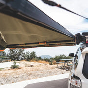 Standing Under The Tuff Stuff 180º Degree XL Awning