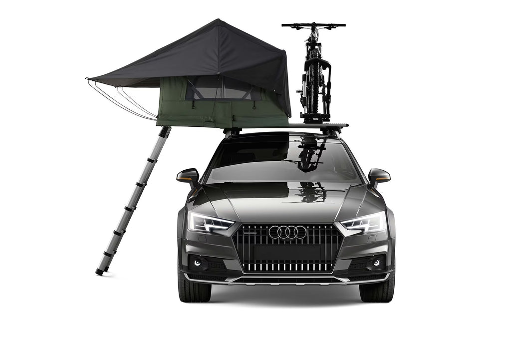 Audi Carrying A Thule 2-Person Roof Top Tent and A Bike