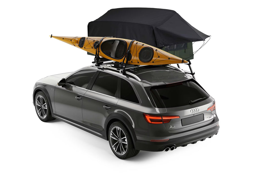Thule 2-Person Roof Top Tent Agave Green And A Kayak Mounted On An Audi A4