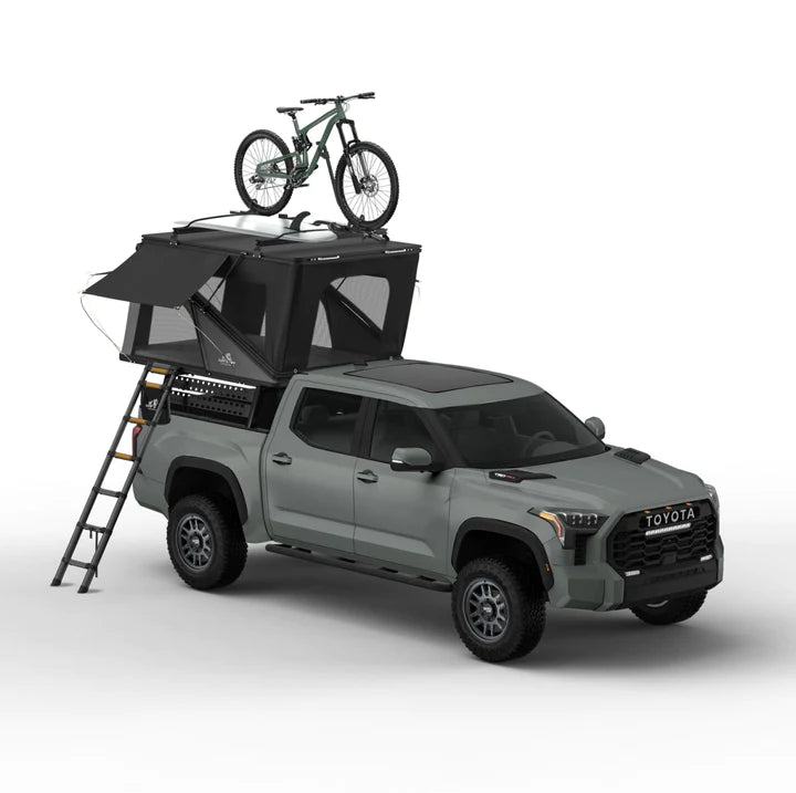 Tuff Stuff Alpine SixtyOne Aluminum Shell Roof Top Tent With A Bike On Top Of The Tent