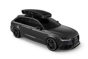 Thule Vector Alpine Rooftop Cargo Carrier On Top of Car Front Side View