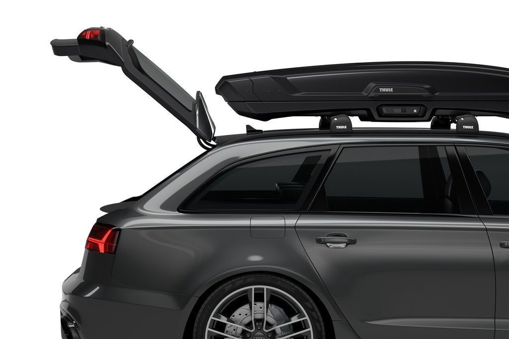 Thule Vector Alpine Rooftop Cargo Carrier On Top of Car Side View