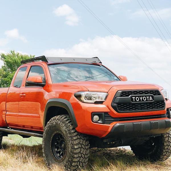 Prinsu Roof Rack for Tacoma 2nd/3rd Gen on red Tacoma in grassland