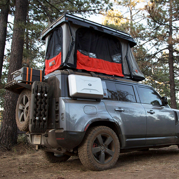 open side view of the badass tents convoy rooftop tent for a land rover new defender 110 2020-2022 model