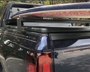 Surfboard Sitting On Top Of The Honda Ridgeline BillieBars Bed Bars