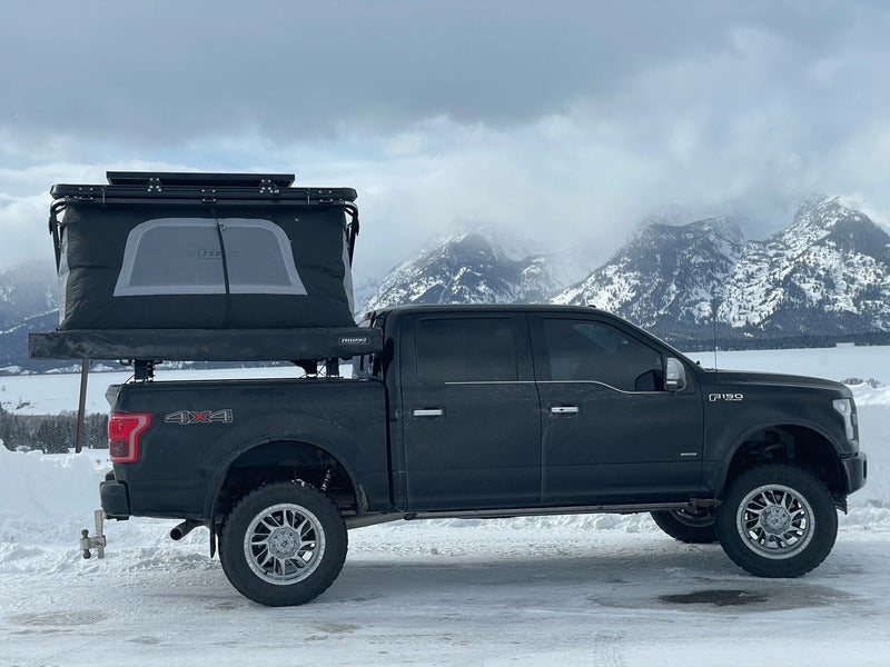 Side View Of The BillieBars Bed Bars For Ford F150, F250, F350 With A Mounted RTT