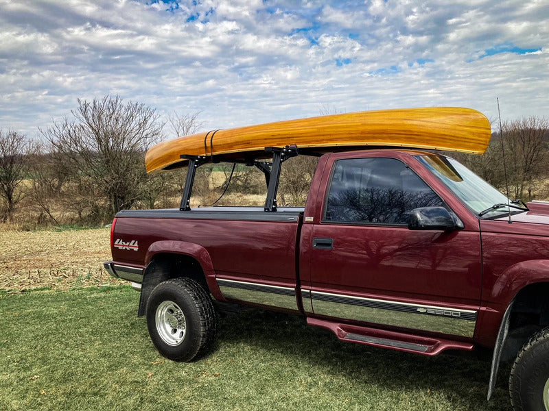 Canoe Mounted On BillieBars Bed Bars For Silverado & Sierra