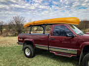 Canoe Mounted On BillieBars Bed Bars For Silverado & Sierra