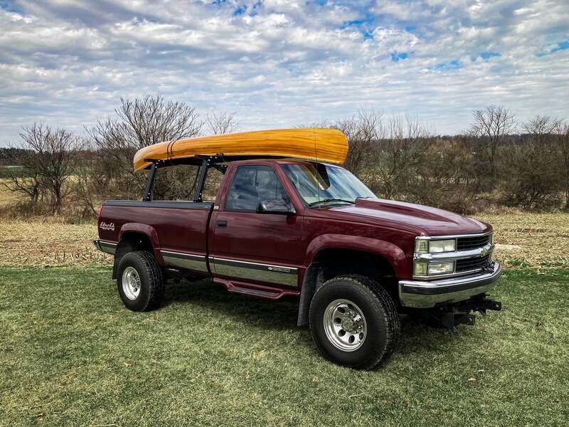 BillieBars Bed Bars For Silverado & Sierra With A Canoe Over It