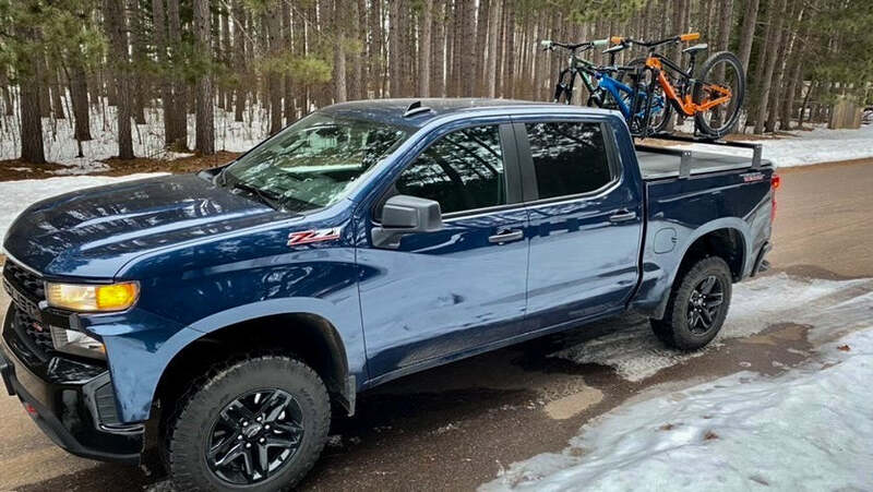 Side View Of The BillieBars Bed Bars For Silverado And Sierra With Mounted Bikes
