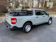 Side View Of The BillieBars Bed Bars For Maverick With A Basket Rack On Top 