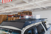 Sherpa Crossbar Risers on The Top of the Vehicle