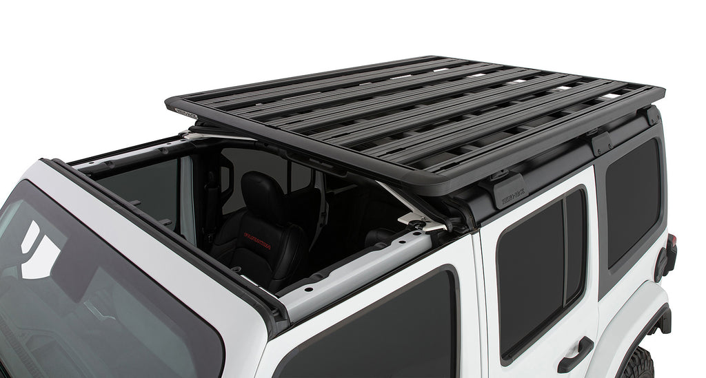 freedom panels open over a jeep wrangler jl with a roof rack from rhino-rack