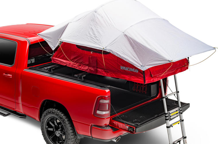 Retrax PowertraxPRO XR Truck Bed Cover For Dodge Ram 1500, 2500 & 3500 with a roof top tent